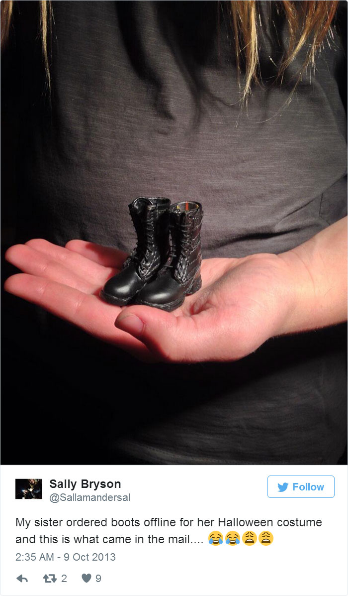 Tiny boots held in a hand, illustrating a regrettable online purchase.