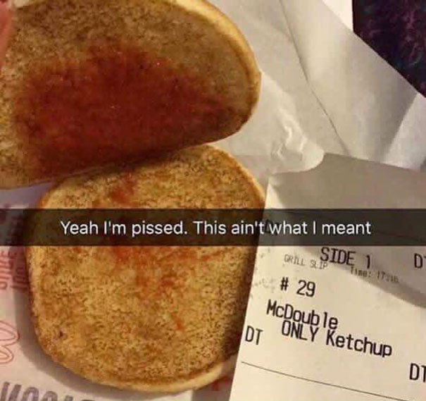 Hilarious Snapchat showing a McDouble missing its patty, with a receipt specifying "ONLY Ketchup."