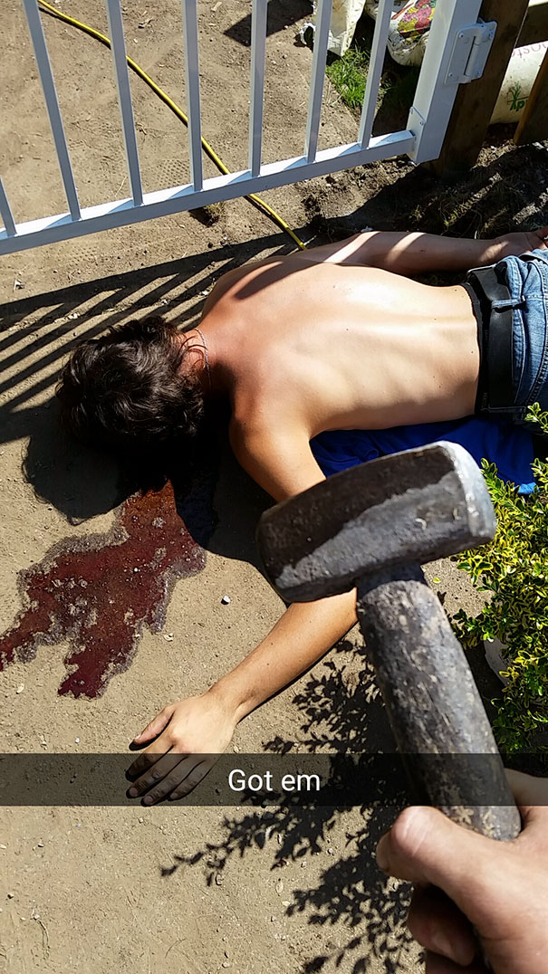 Person playfully posed with hammer, imitating drama in a humorous Snapchat.