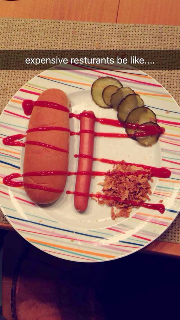 Humorous Snapchat of a hot dog meal styled like fine dining with ketchup decor.