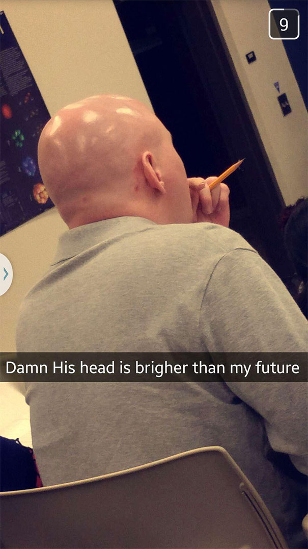 Bald man in class with caption: "His head is brighter than my future," capturing a hilarious Snapchat moment.