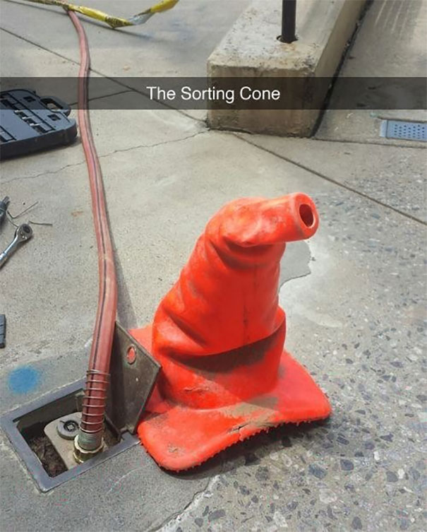 Hilarious Snapchat of a traffic cone shaped like a wizard's hat, humorously called "The Sorting Cone."