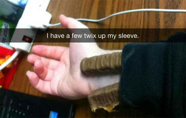 Funny Snapchat showing Twix bars under a sleeve with text overlay: "I have a few twix up my sleeve."