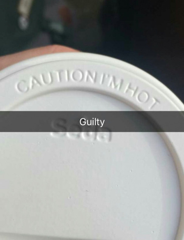 A coffee cup lid with "Caution I'm Hot" and "Guilty" text overlay; a hilarious Snapchat moment captured.