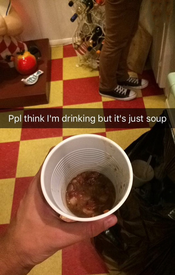 Hand holding a cup of soup with a funny Snapchat caption about being mistaken for a drink at a party.