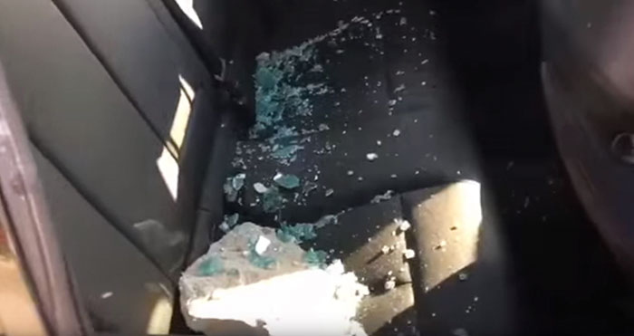 man-break-window-stone-dog-hot-car-5 man-break-window-stone-dog-hot-car-5