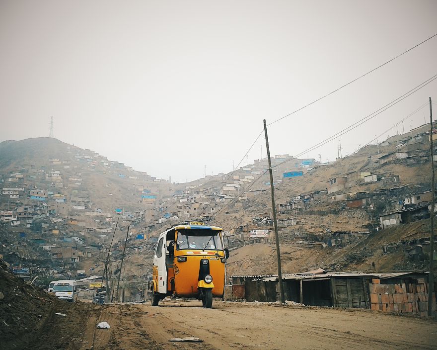 A Yellow Tuk Tuk.