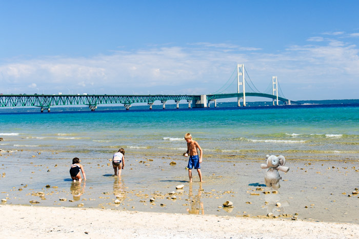Taking A Dip In Lake Huron Near The Mackinac Bridge, Michigan
