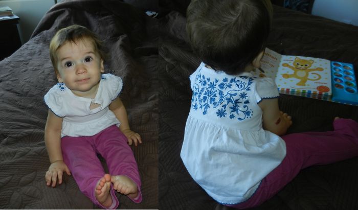 Grandpa Tries His Hand At Dressing The Baby....