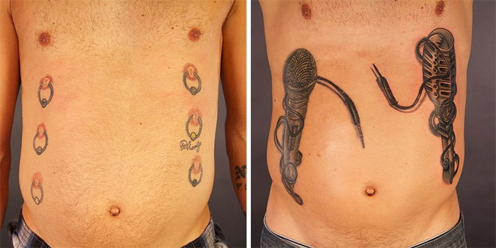 Creative cover-up tattoo transforming old designs into a realistic microphone and cable art on the torso.