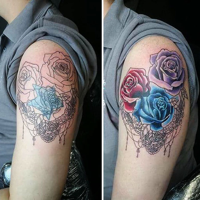 Creative cover-up tattoo of colorful roses on arm, transforming an old design.