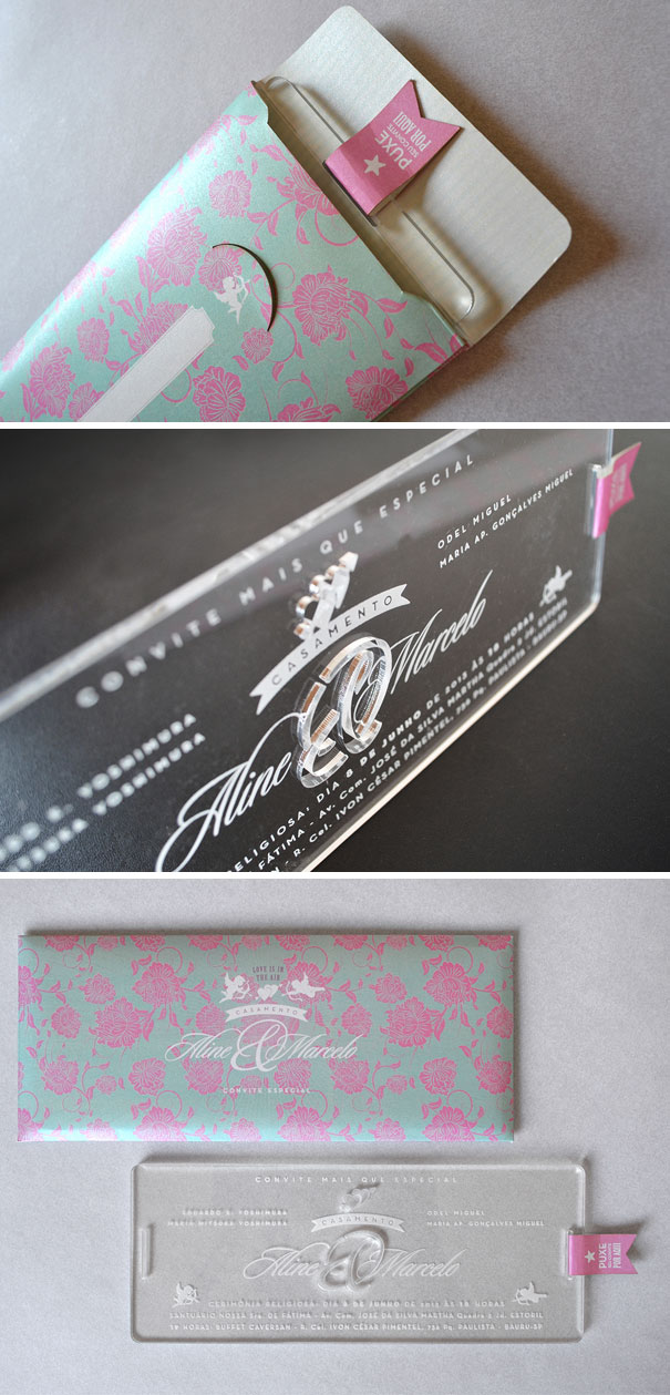 Creative wedding invitations featuring elegant transparent acrylic design with floral patterned envelope and fine lettering details.