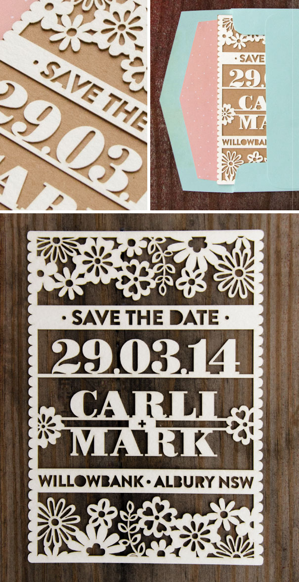 Intricate laser-cut creative wedding invitation with floral designs and save the date details in a wooden background setting.