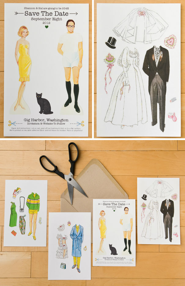 Colorful creative wedding invitations with paper doll cutouts and mix-and-match outfits displayed with scissors and an envelope on wood.