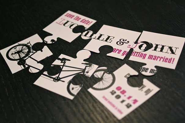 Puzzle piece wedding invitation with bicycle graphic and text featuring creative wedding invitation design elements.