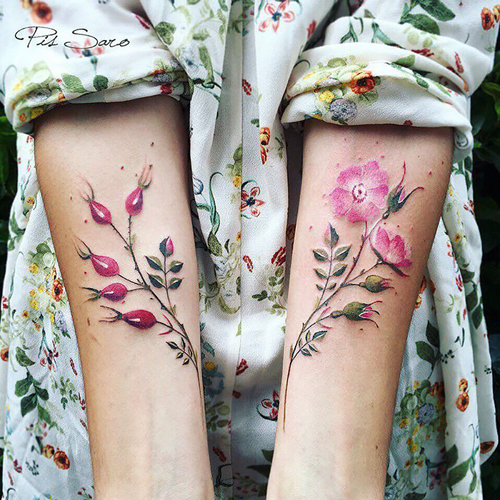 Ethereal nature tattoos of blooming flowers on forearms, inspired by changing seasons and botanical art.