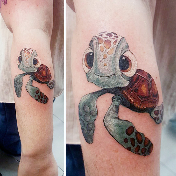 Pixar tattoo of a cartoon turtle on a person's arm, showcasing vibrant colors and detailed artwork.