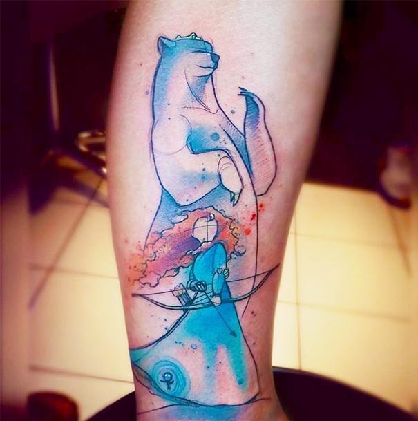 Pixar-inspired tattoo featuring a stylized bear and archer in blue tones on an arm.