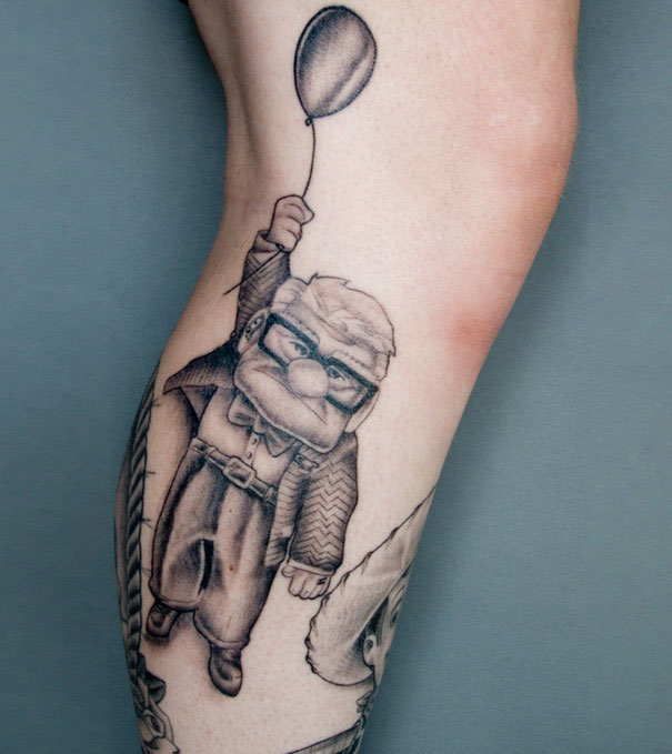Pixar-inspired tattoo of an elderly man holding a balloon on a person's leg.