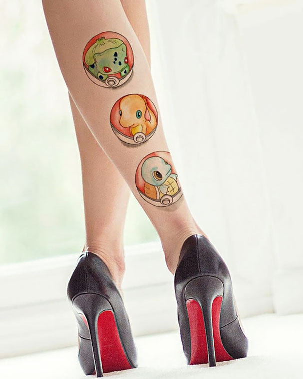 Leg with colorful Pokemon tattoos of Bulbasaur, Charmander, and Squirtle, wearing black high heels.