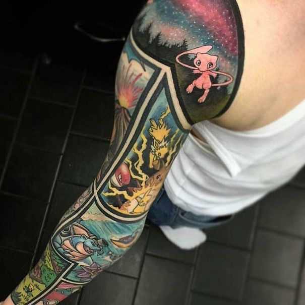 Pokemon tattoos on a person's arm featuring colorful designs of various characters in a detailed, comic-like style.