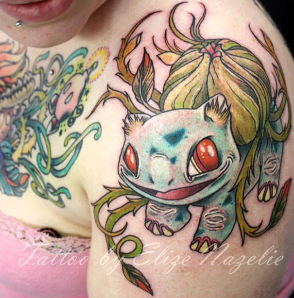 Colorful Pokemon tattoo featuring Bulbasaur on a person's shoulder.