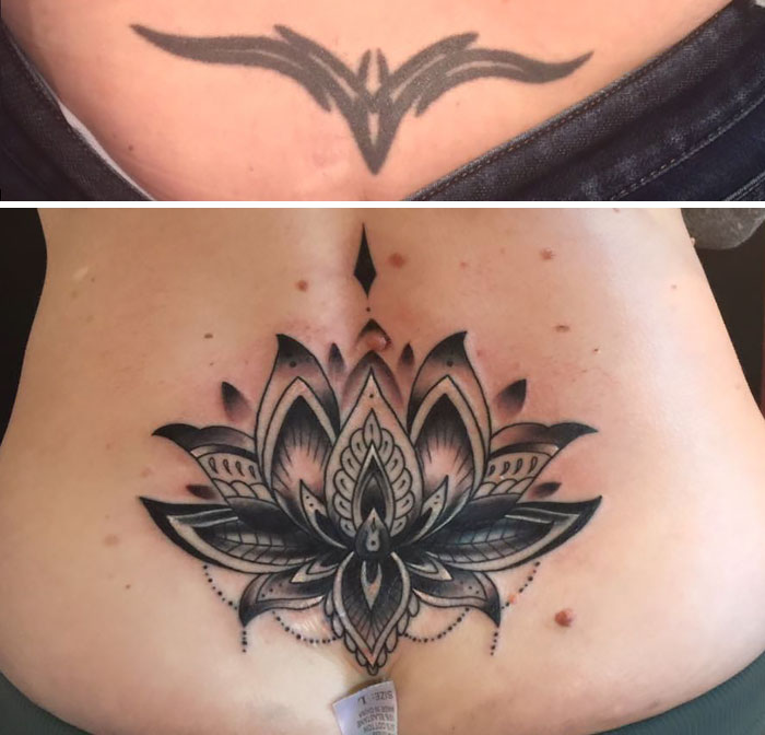Cover-up tattoo transforming old design into intricate black and grey lotus artwork on lower back.