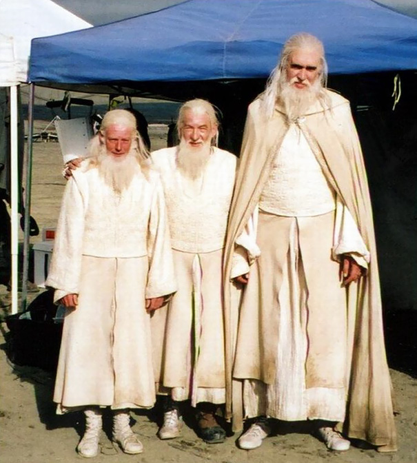 Three men dressed as wizards on a film set showing an example of Hollywood celebrity body doubles.