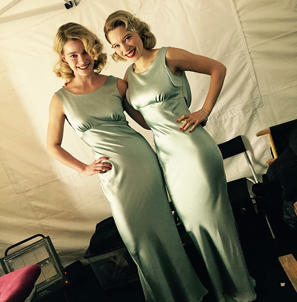 Two women in matching silver dresses posing together, illustrating Hollywood celebrities’ body doubles concept.