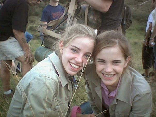 Two young women smiling outdoors on a film set, illustrating Hollywood celebrities’ body doubles in action.
