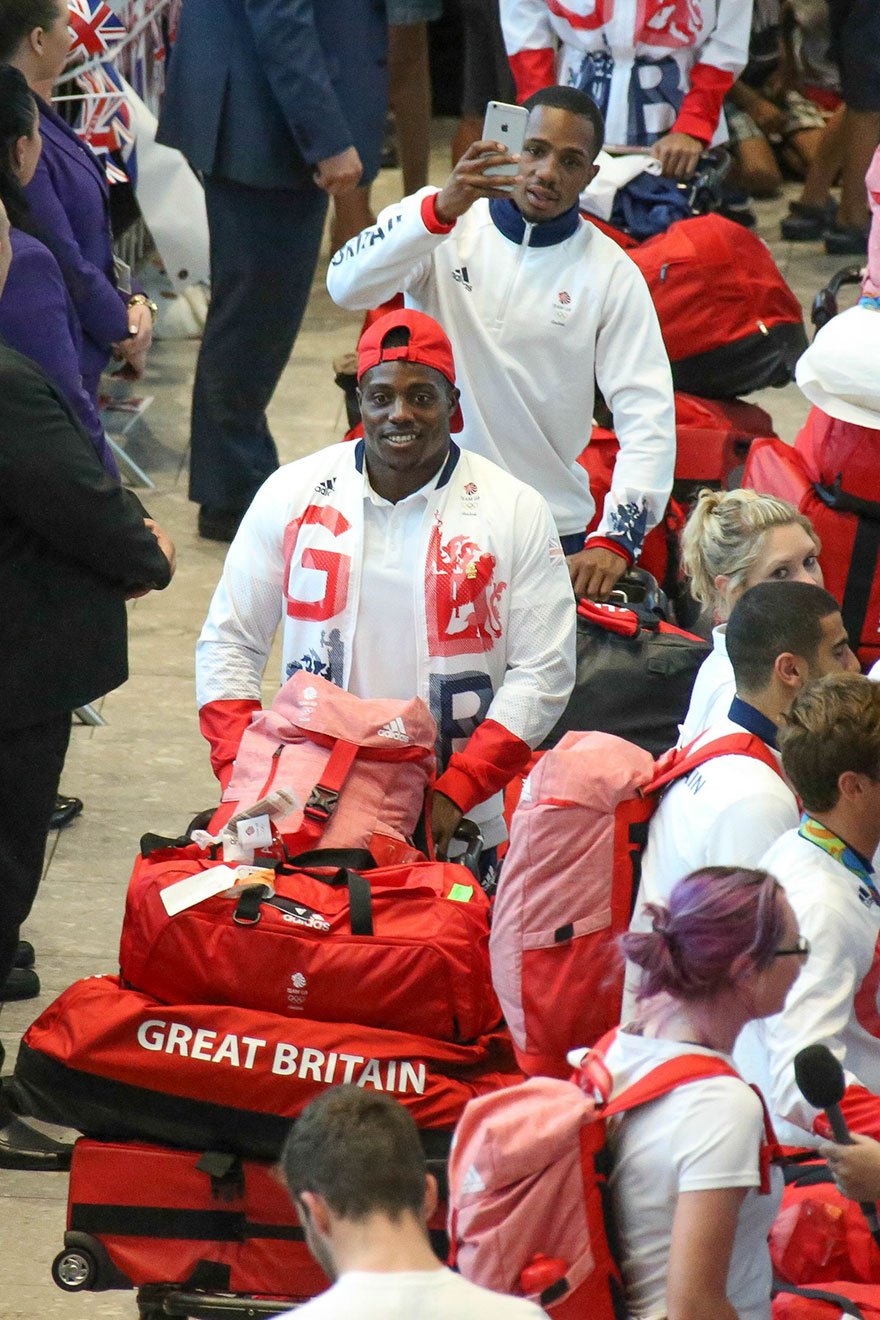 british-olympic-athletes-red-bags-heathrow-airport-9 british-olympic-athletes-red-bags-heathrow-airport-9