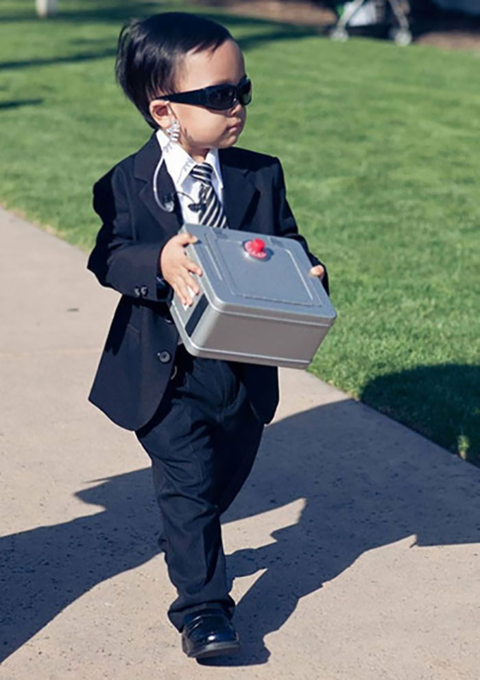 Ring Bearer Taking His Duties Very Seriously