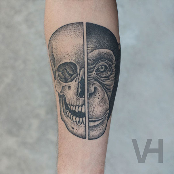 Symmetrical tattoo by Valentin Hirsch, featuring a half-skull and half-monkey face blending nature and geometry.