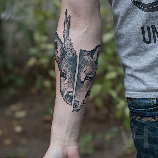 Symmetrical tattoo on arm featuring deer head blending nature and geometry.