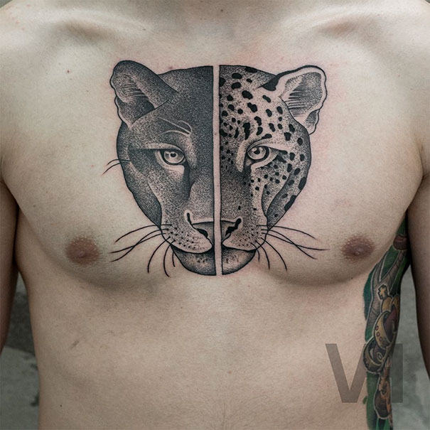 Symmetrical tattoo of a panther and leopard face on chest, blending nature and geometry in perfect balance.