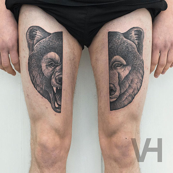 Symmetrical tattoos on thighs blend nature and geometry, featuring a bear design by Valentin Hirsch.