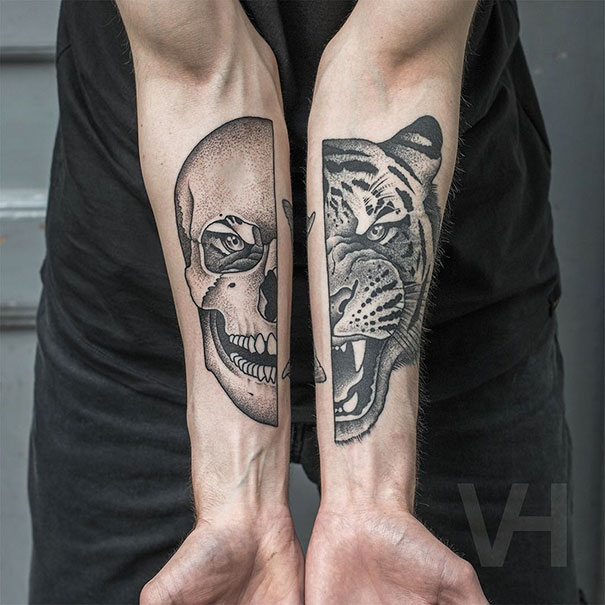 Symmetrical tattoos by Valentin Hirsch featuring a skull and tiger, blending nature and geometry on forearms.