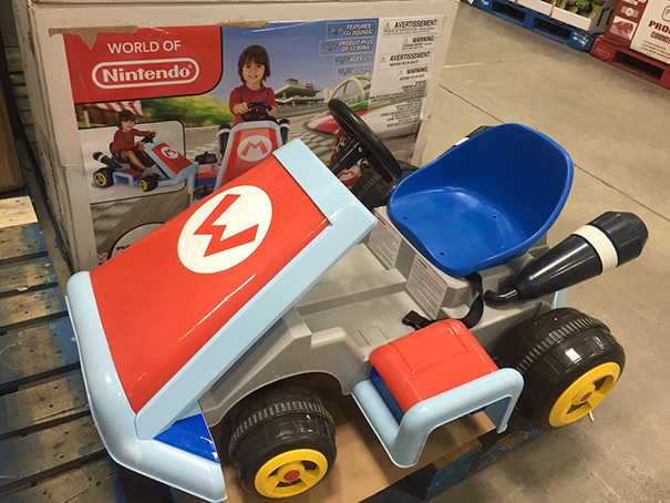 Mario Kart toy car improperly assembled with seat backward, showcasing a common job fail in the World of Nintendo series.