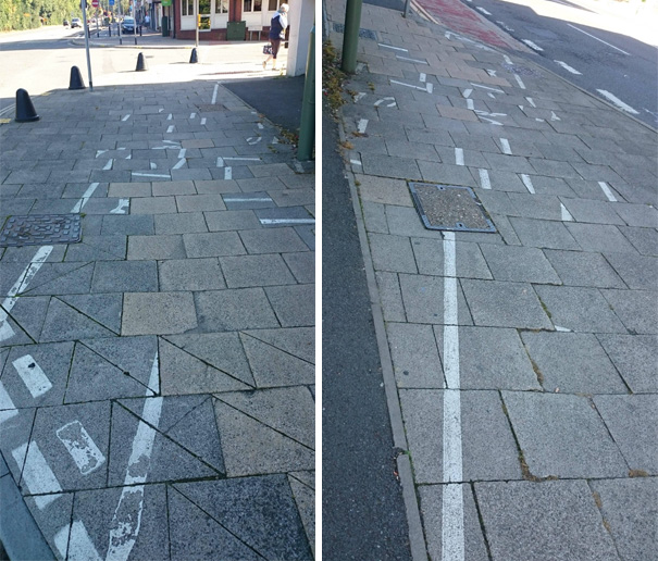 Failed road markings with mismatched lines on a sidewalk, showing a poorly executed job.