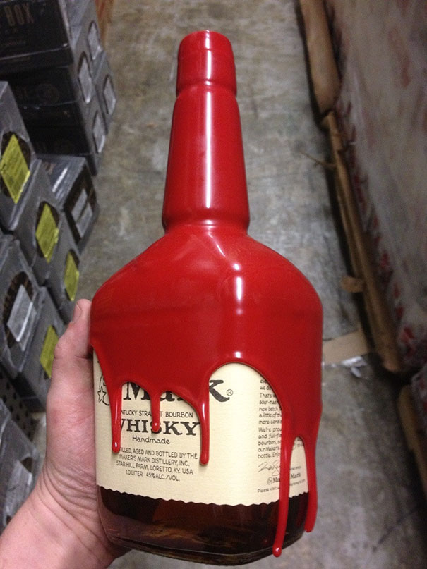 Bottle with red wax dripping, label misspelled as "whiky," illustrating a job fail.