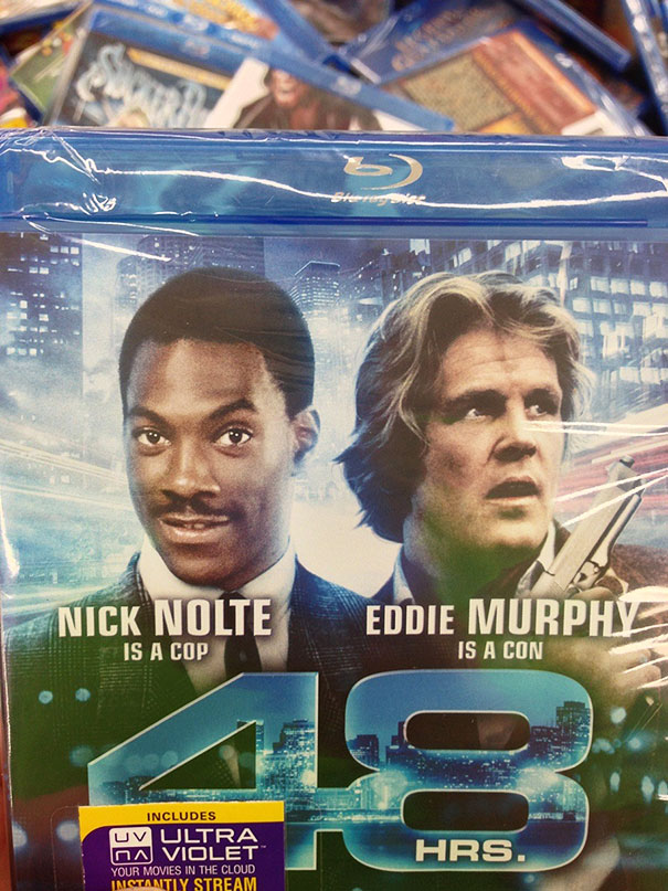 Blu-ray cover shows swapped names: "Nick Nolte is a cop" and "Eddie Murphy is a con" in error, a humorous job fail.