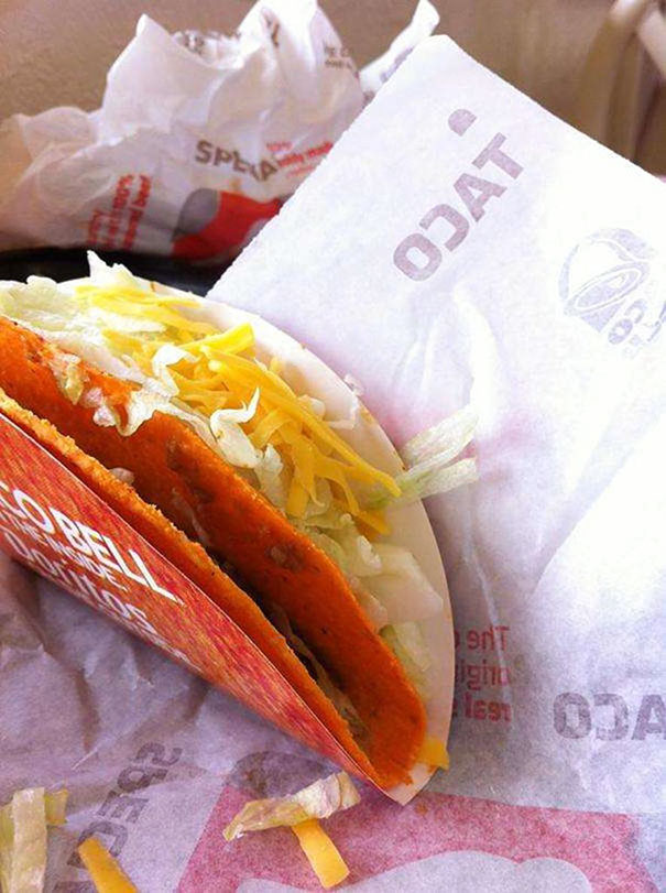 Taco wrapper fail with a taco placed incorrectly inside the holder.