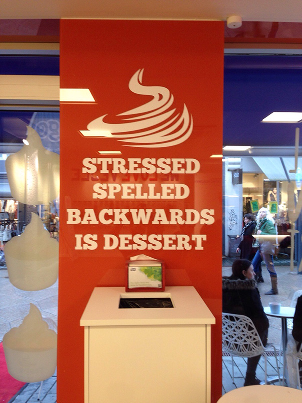 Sign with phrase "Stressed spelled backwards is dessert" in a dessert shop.