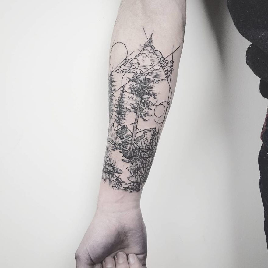 Sketchy tattoo with trees and houses on a forearm, showcasing artistic style by Vesna.