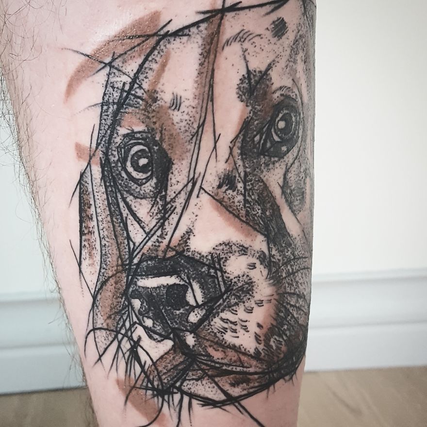 Sketchy tattoo of a dog's face with abstract lines and shading by Vesna.