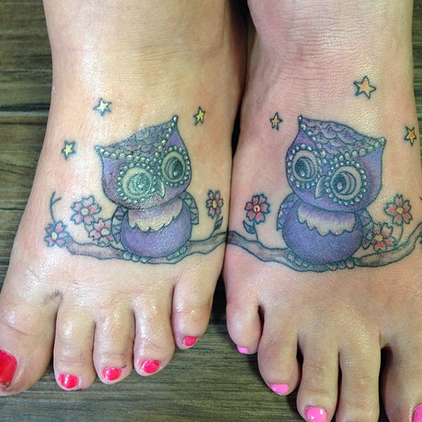 Owl trio tattoos on feet, featuring purple owls on branches with flowers and stars, showcasing creative trio tattoo designs.