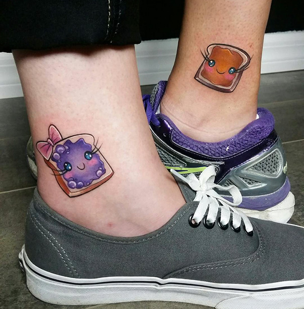 Cute trio tattoos featuring cartoon toast with blueberry and peanut butter on ankles, symbolizing friendship.