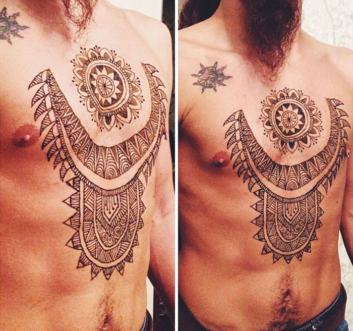 Two men displaying intricate henna tattoos on their chests as part of the Menna trend.