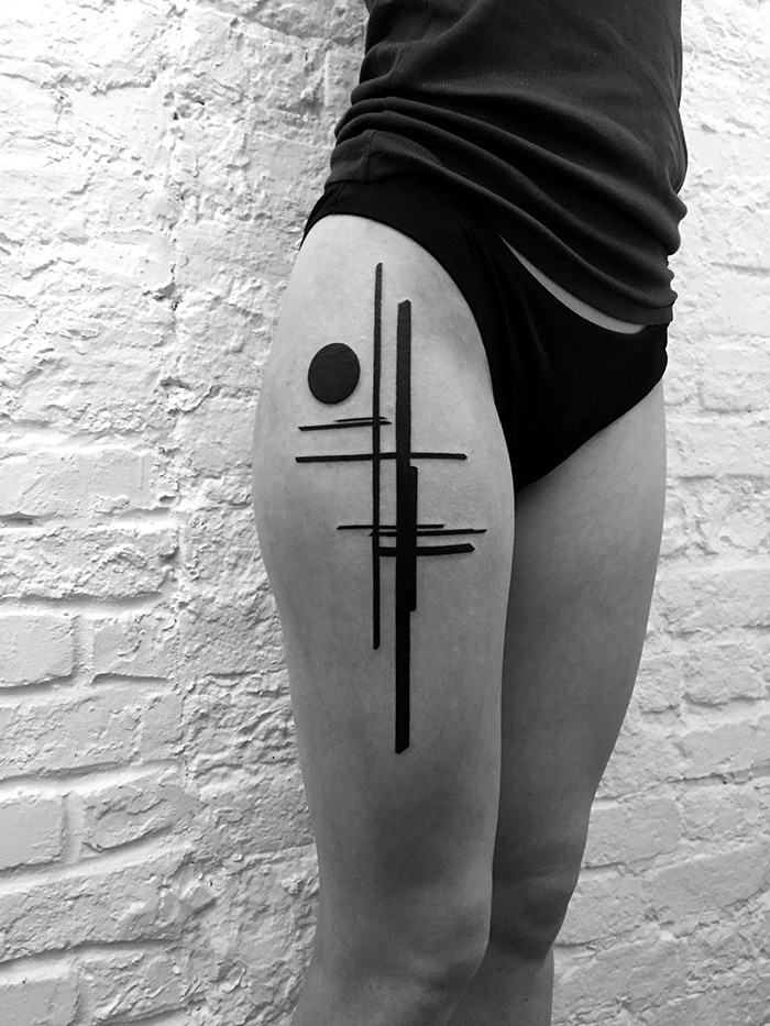 Minimalist digitally-designed tattoo by Russian artist on a person's thigh, featuring geometric lines and a circle.