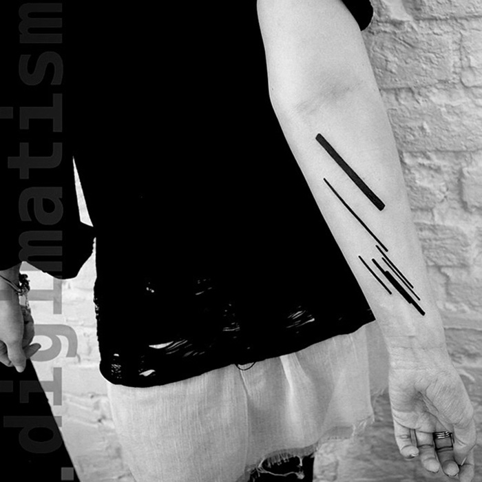 Minimalist digitally-designed tattoo with geometric lines on a person's forearm, created by a Russian artist.